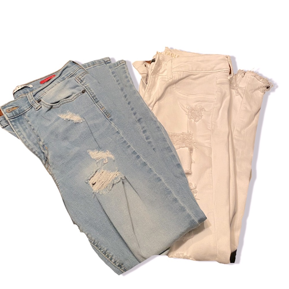 I am giving away 2 pairs of tight jeans (a little stretchy) with rips.